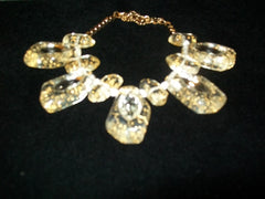 Clear Necklace With Gold Sprinkles